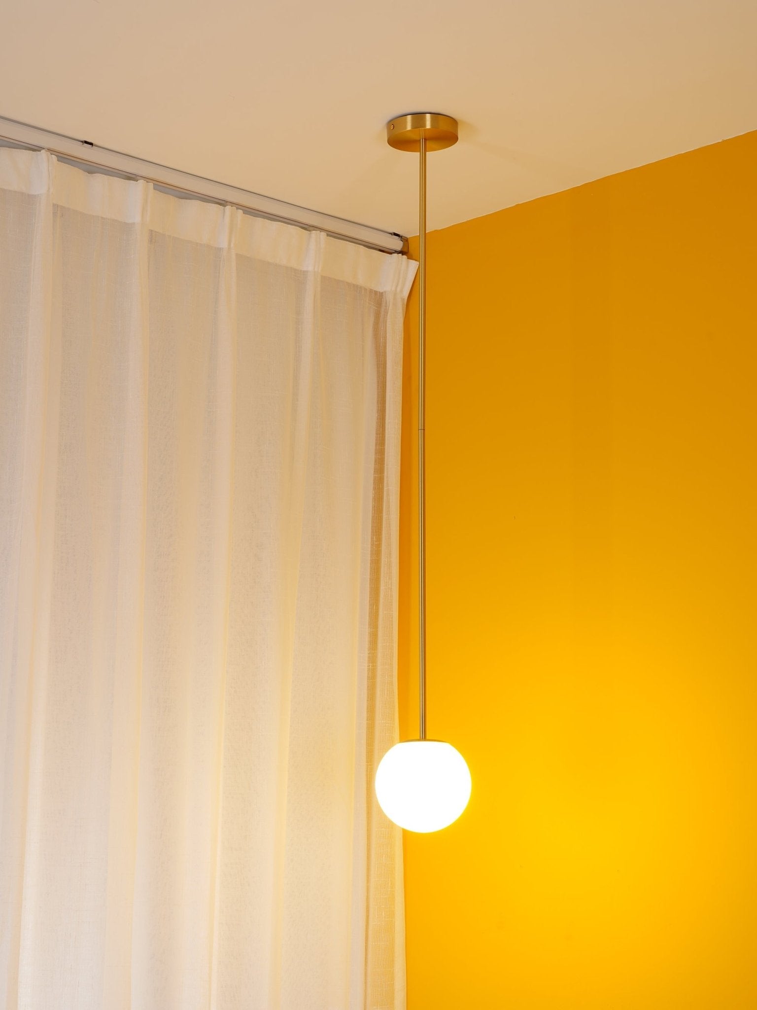 Minimalist Brass Globe Glass Pendant 1-Light Lasson Living