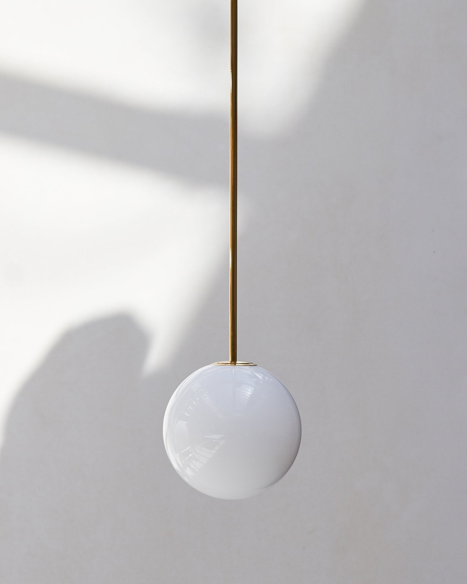 Minimalist Brass Globe Glass Pendant 1-Light Lasson Living
