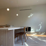 Minimalist Brass Globe Glass Pendant 1-Light Lasson Living