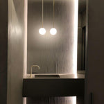 Minimalist Brass Globe Glass Pendant 1-Light Lasson Living