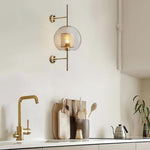 Clear Glass Globe Sconces With Cylindrical Inner Cage - Image 1