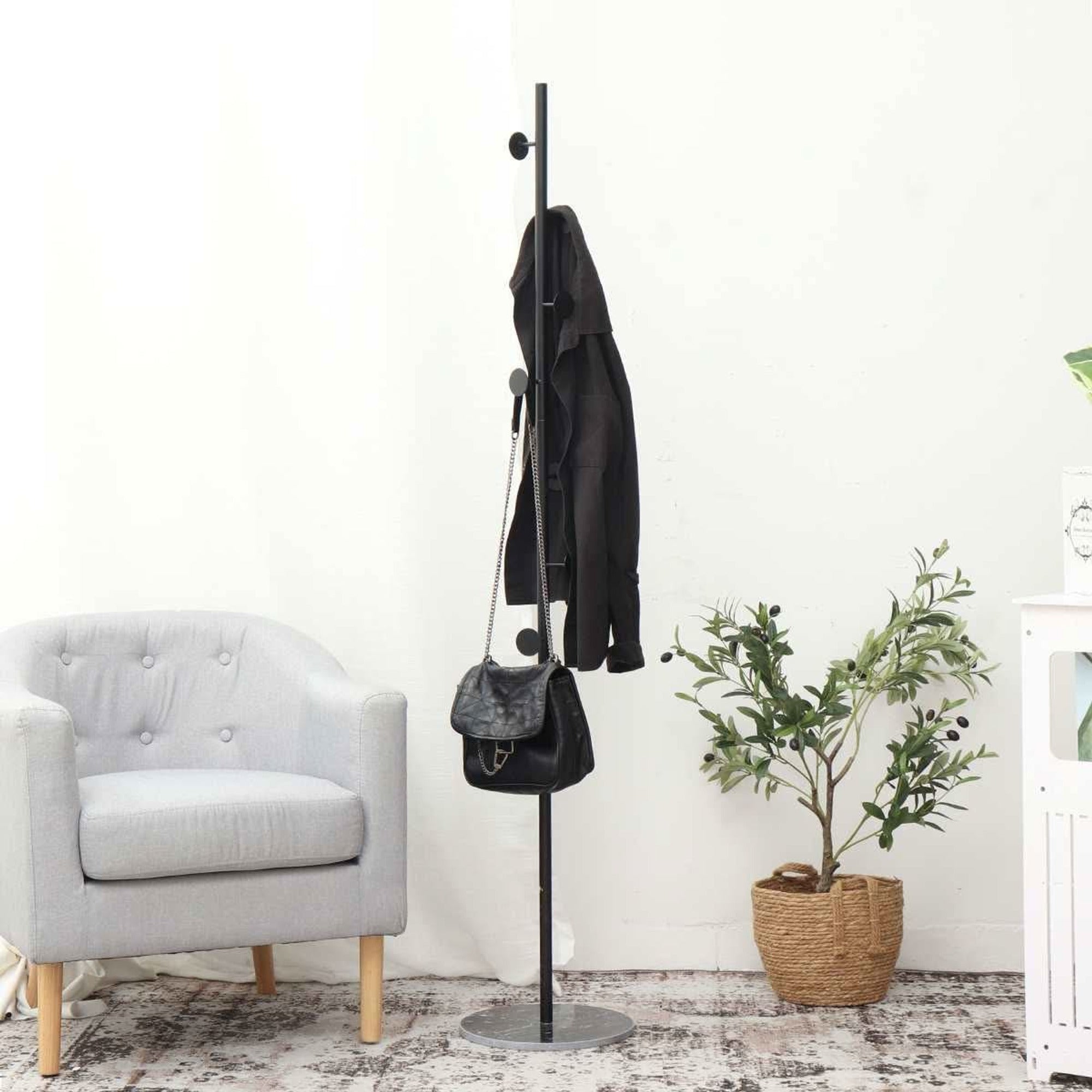Clothing Rack with Streamlined Vertical Design and Hooks - Image 1