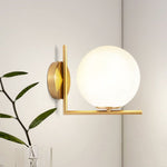 Dimmable Glass Globe Sconces With Brass Arm - Image 5