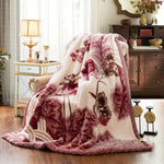 Quilted Floral Weighted Blanket With Plush Texture - Image 1